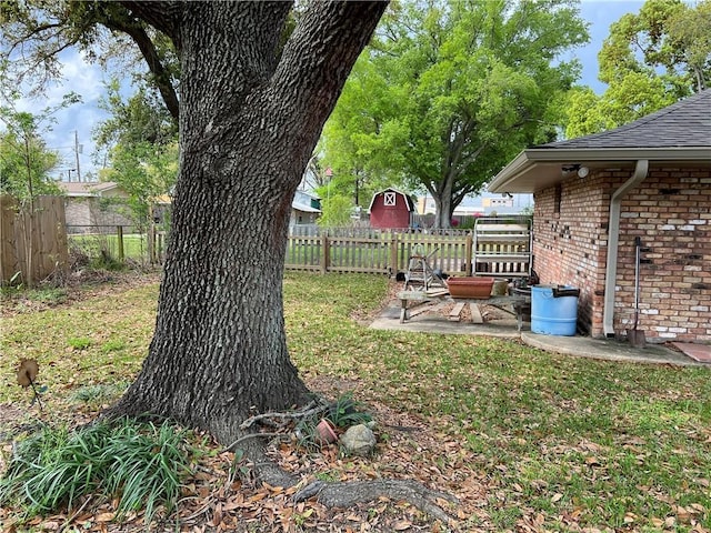 137 Nolan Dr, La Place, LA 70068 - view of yard featuring a patio and fence