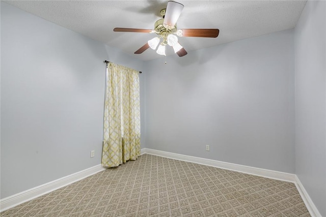 302 Bogie Dr Unit 25D, Slidell, LA 70460 - spare room featuring light carpet, a ceiling fan, and a textured ceiling