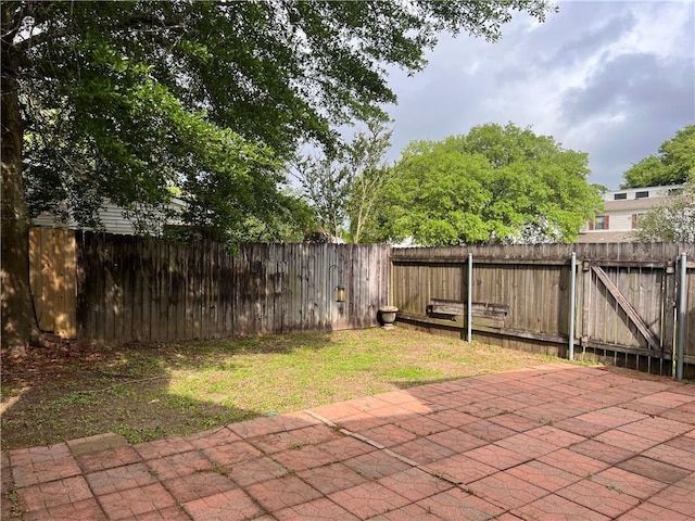 302 Bogie Dr Unit 25D, Slidell, LA 70460 - fenced backyard featuring a patio area