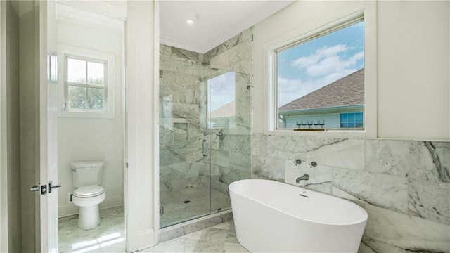 8520 Creole Dr, Chalmette, LA 70043 - full bath with a marble finish shower, marble finish floor, toilet, and a freestanding tub