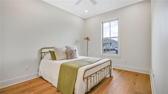 8520 Creole Dr, Chalmette, LA 70043 - bedroom featuring baseboards, ceiling fan, and light wood finished floors