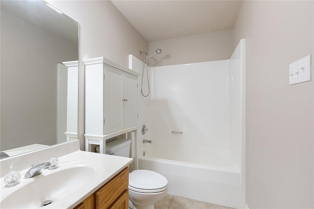 bathroom with toilet, vanity, tile patterned floors, and bathing tub / shower combination