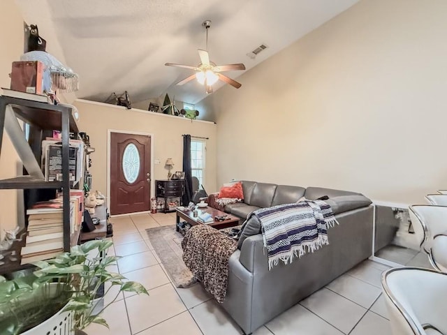 5930 Louisville St, New Orleans, LA 70124 - living area featuring light tile patterned floors, visible vents, a ceiling fan, and vaulted ceiling