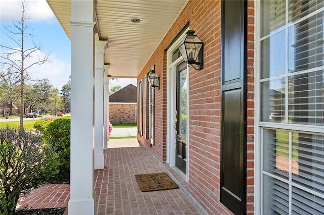 view of patio featuring a porch
