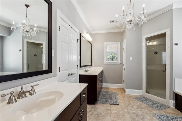 bathroom with a sink, a shower stall, visible vents, and a chandelier