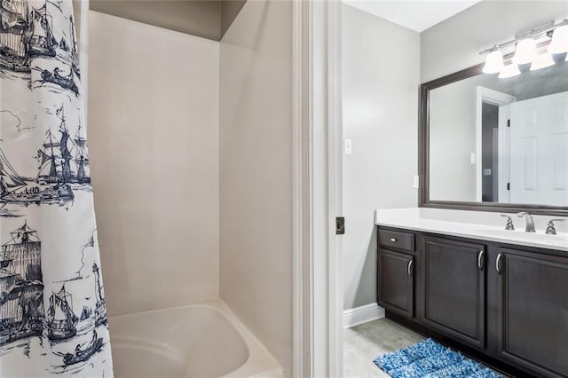 bathroom featuring shower / tub combo with curtain and vanity