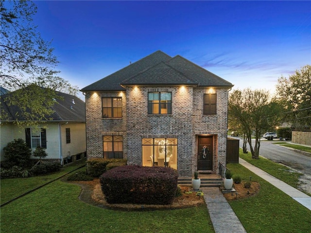 5878 General Haig St, New Orleans, LA 70124 - french country inspired facade featuring brick siding and a lawn