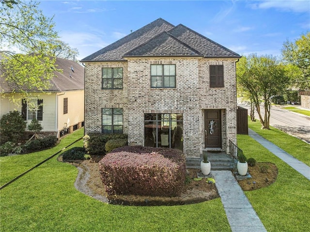 5878 General Haig St, New Orleans, LA 70124 - french country style house with brick siding, a front lawn, and roof with shingles
