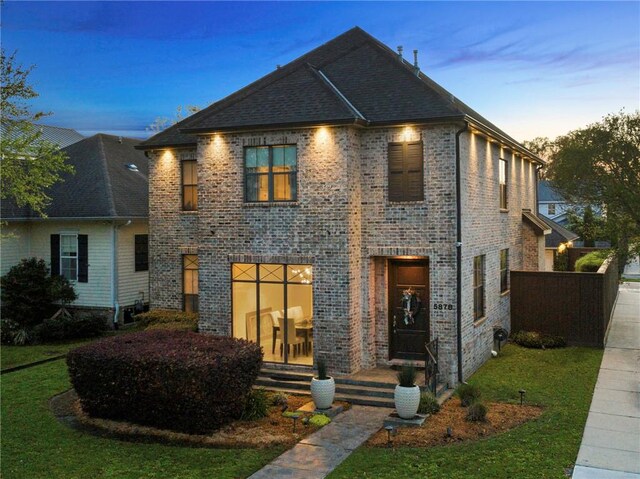 5878 General Haig St, New Orleans, LA 70124 - french provincial home featuring brick siding and a front lawn