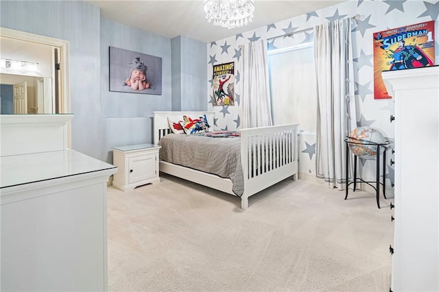 5878 General Haig St, New Orleans, LA 70124 - bedroom with light colored carpet, wallpapered walls, and a chandelier