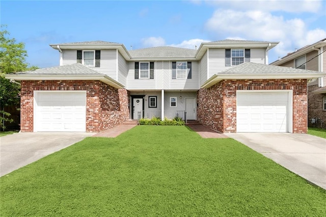 view of front facade featuring brick siding, a garage, concrete driveway, and a front lawn