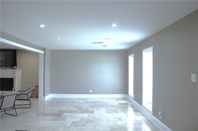 4043 S Pin Oak Ave, New Orleans, LA 70131 - unfurnished room featuring recessed lighting, a fireplace, visible vents, and baseboards
