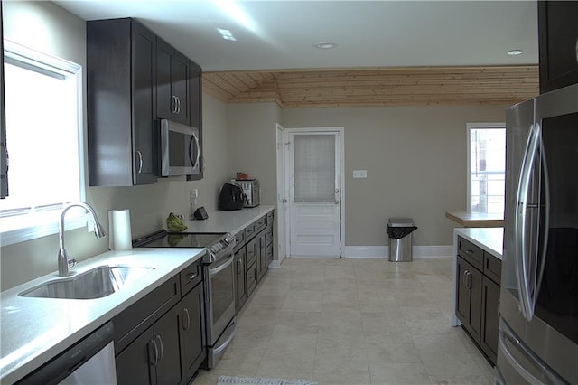 4043 S Pin Oak Ave, New Orleans, LA 70131 - kitchen with a sink, baseboards, appliances with stainless steel finishes, and light countertops