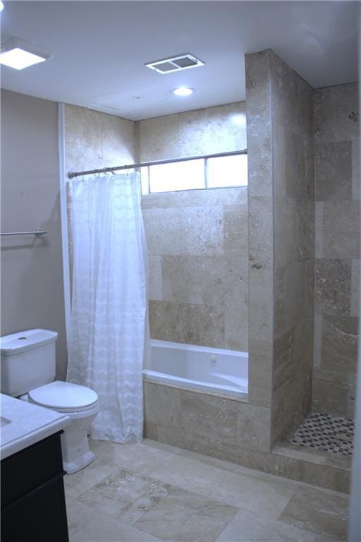 4043 S Pin Oak Ave, New Orleans, LA 70131 - full bathroom featuring tiled shower / bath combo, visible vents, toilet, and vanity