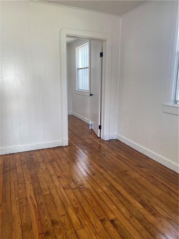 512 Fos Ave, Marrero, LA 70058 - empty room with wood-type flooring, crown molding, and baseboards