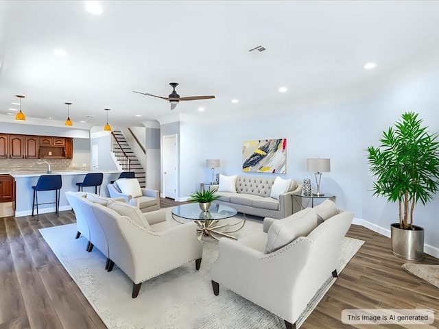 living area with recessed lighting, visible vents, dark wood-type flooring, and ceiling fan