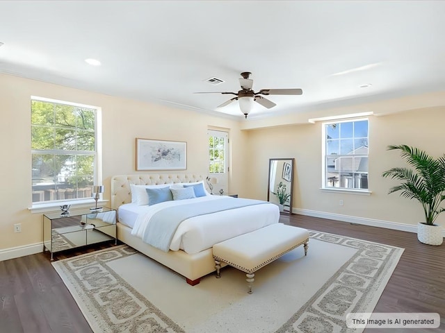 bedroom featuring wood finished floors, visible vents, a ceiling fan, and baseboards