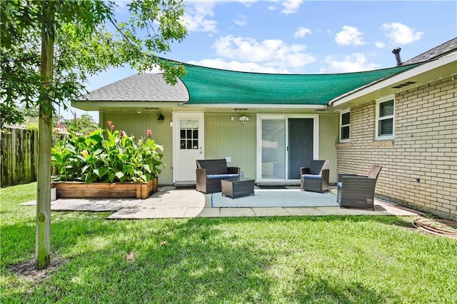 1558 Monaco Dr, Slidell, LA 70458 - back of house with a patio, brick siding, and an outdoor hangout area