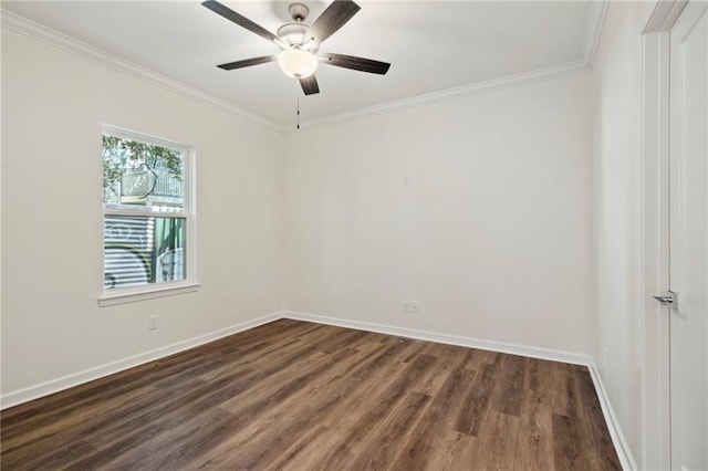 unfurnished room featuring crown molding, a ceiling fan, dark wood finished floors, and baseboards