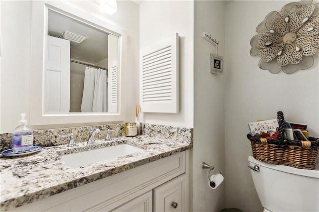 6720 Argonne Boulevard ., New Orleans, LA 70124 - bathroom with toilet and vanity