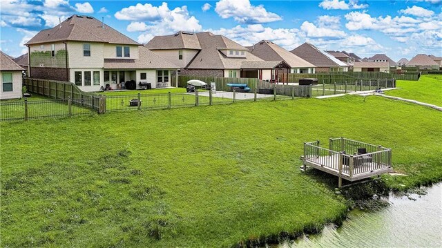 exterior space featuring a patio, a fenced backyard, and a residential view