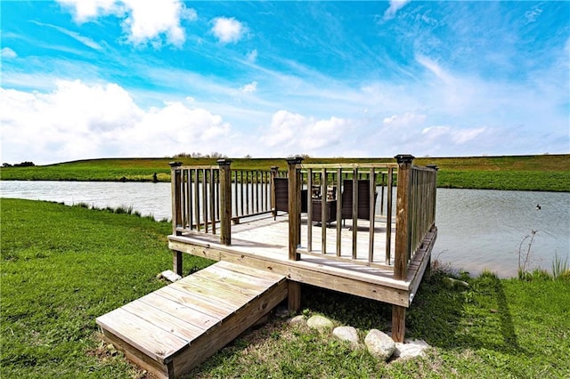 deck featuring a lawn and a water view