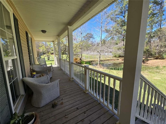 wooden deck featuring a porch