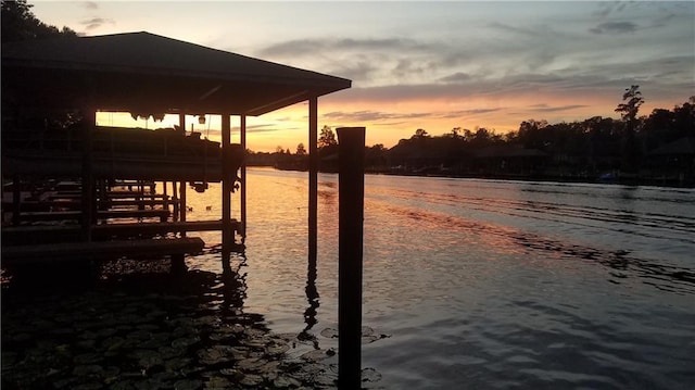 20996 Diversion Canal Rd, Saint Amant, LA 70774 - dock area featuring boat lift and a water view
