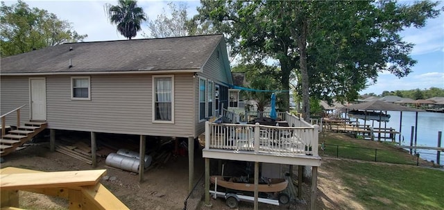 20996 Diversion Canal Rd, Saint Amant, LA 70774 - rear view of property with a water view, entry steps, roof with shingles, and fence