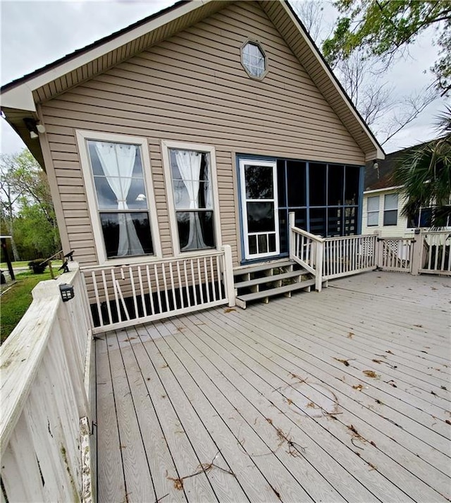 20996 Diversion Canal Rd, Saint Amant, LA 70774 - deck featuring a sunroom