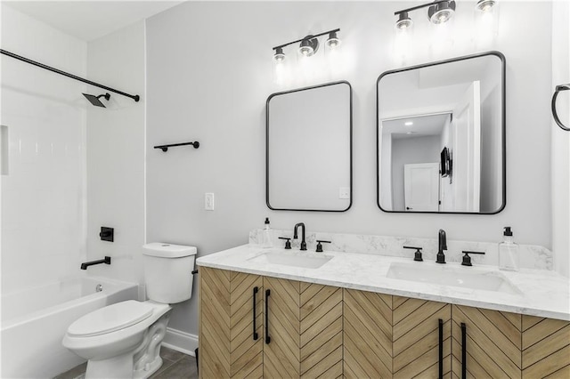 1413 Gordon St, New Orleans, LA 70117 - bathroom featuring toilet, double vanity, baseboards, and tub / shower combination