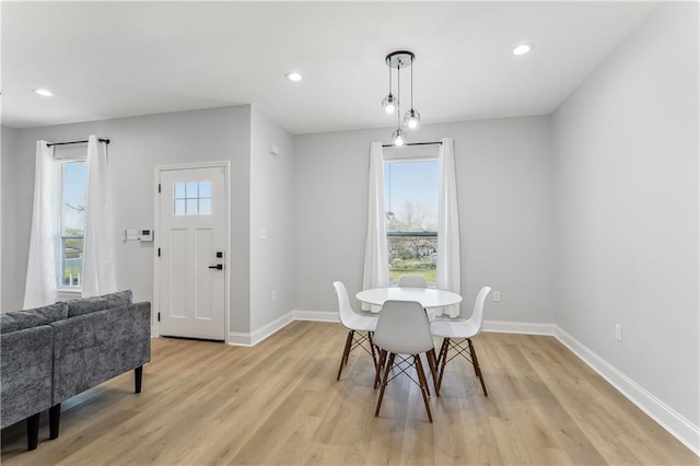 1413 Gordon St, New Orleans, LA 70117 - dining room with light wood-style flooring, baseboards, and recessed lighting