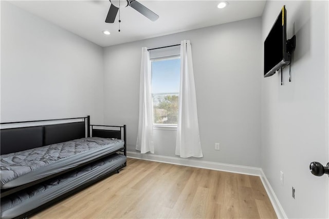 1413 Gordon St, New Orleans, LA 70117 - bedroom with light wood finished floors, recessed lighting, baseboards, and a ceiling fan