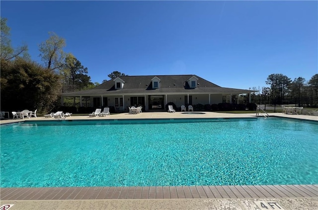 pool with a patio area