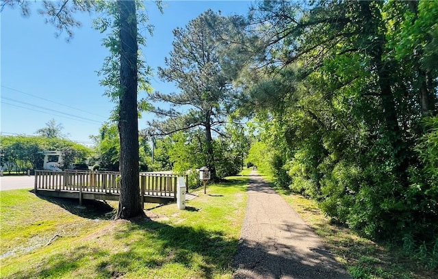 view of yard with a wooden deck