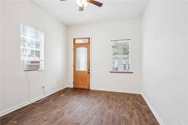 320709 Bienville St, New Orleans, LA 70119 - empty room featuring dark wood-type flooring, a ceiling fan, cooling unit, and a healthy amount of sunlight