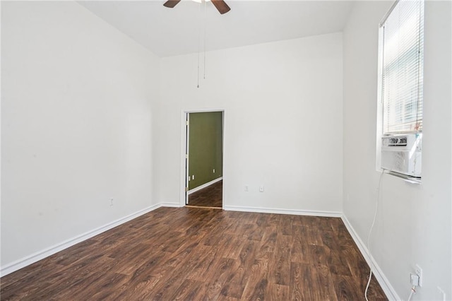 320709 Bienville St, New Orleans, LA 70119 - spare room with cooling unit, ceiling fan, baseboards, and wood finished floors