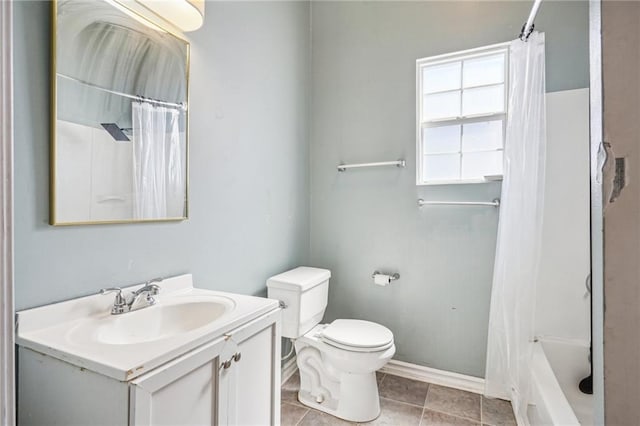320709 Bienville St, New Orleans, LA 70119 - full bath with vanity, baseboards, tile patterned flooring, shower / bath combination with curtain, and toilet