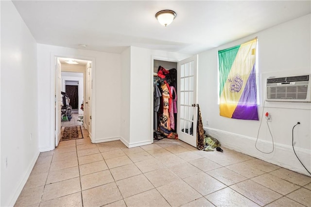 320709 Bienville St, New Orleans, LA 70119 - unfurnished room with baseboards and light tile patterned flooring