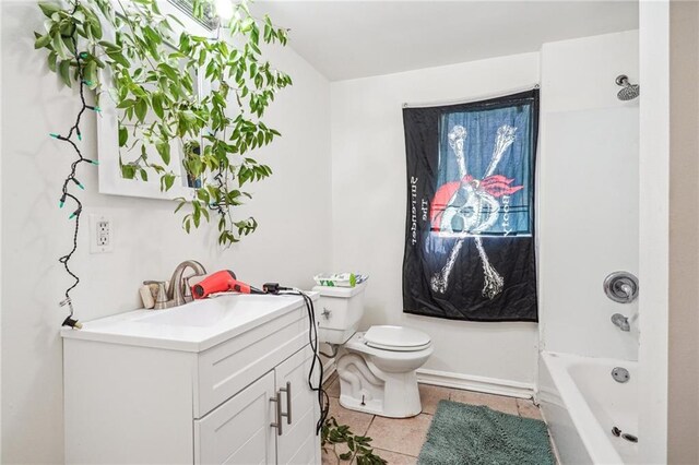 320709 Bienville St, New Orleans, LA 70119 - bathroom featuring tile patterned floors, vanity, bathtub / shower combination, and toilet