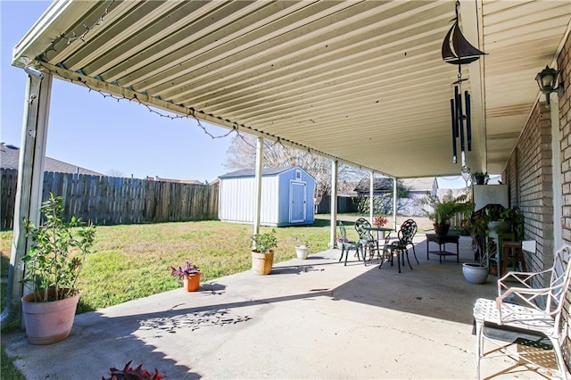 4504 Stella Dr, Meraux, LA 70075 - view of patio / terrace featuring a storage shed, a fenced backyard, and an outdoor structure