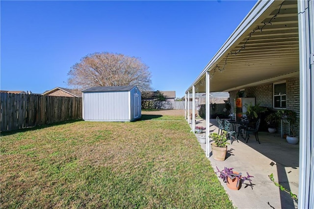 4504 Stella Dr, Meraux, LA 70075 - view of yard featuring a fenced backyard, a shed, a patio, and an outdoor structure