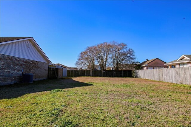 4504 Stella Dr, Meraux, LA 70075 - view of yard with cooling unit and fence