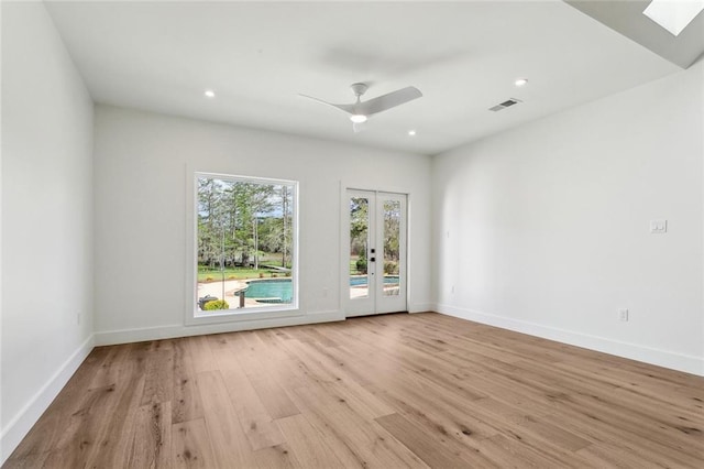 unfurnished room featuring french doors, wood finished floors, baseboards, recessed lighting, and ceiling fan