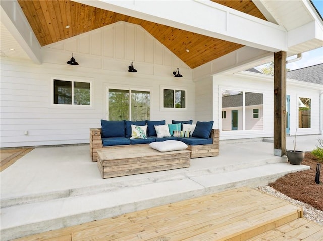 view of patio with an outdoor hangout area and a wooden deck