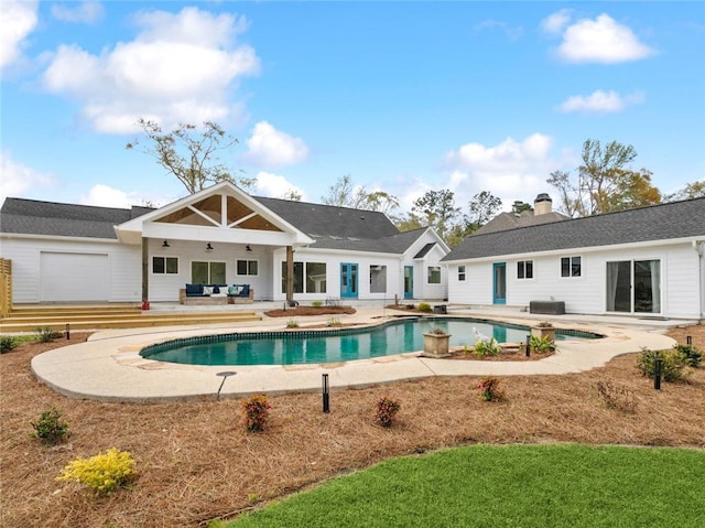 swimming pool featuring a patio and an outdoor hangout area