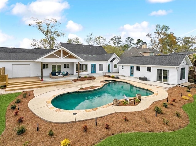 swimming pool with a patio