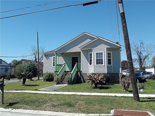 4800 Eastview Dr, New Orleans, LA 70126 - view of front of home featuring a front lawn