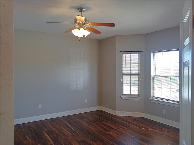 4800 Eastview Dr, New Orleans, LA 70126 - empty room featuring baseboards, a ceiling fan, and dark wood finished floors
