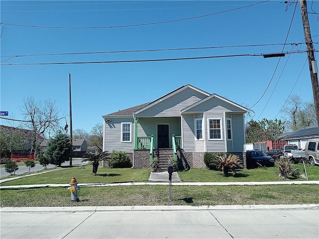 4800 Eastview Dr, New Orleans, LA 70126 - bungalow with a front lawn